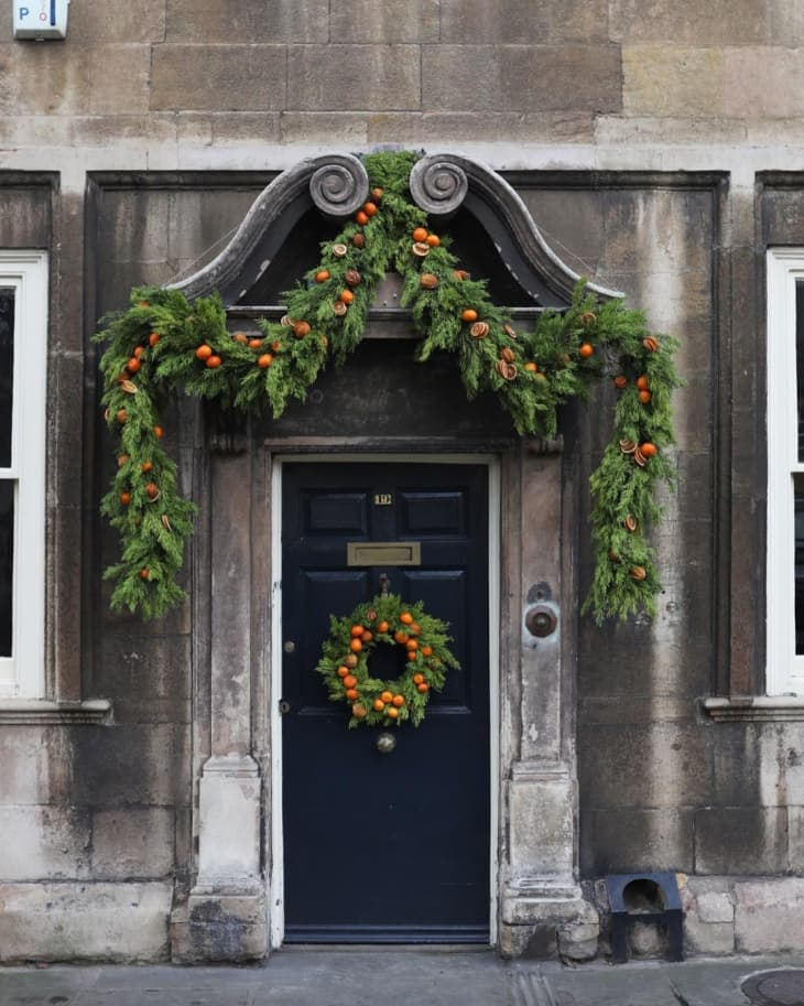 15 ideias festivas de decoração de porta de Natal para todos os estilos